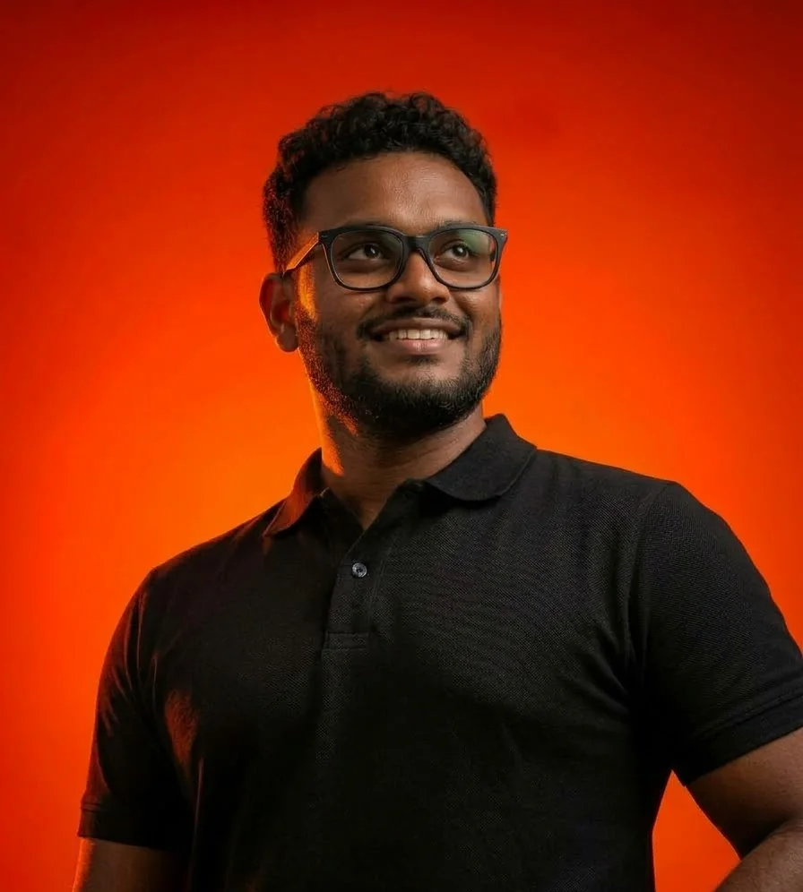 Nethma Dissanayake smiling in a black polo shirt